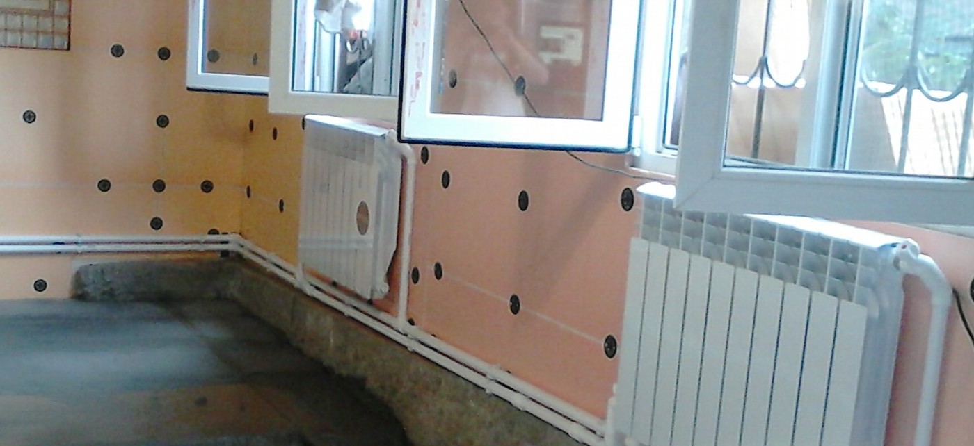 Ремонт квартиры. утепление стен,установка радиаторов и труб отопления
